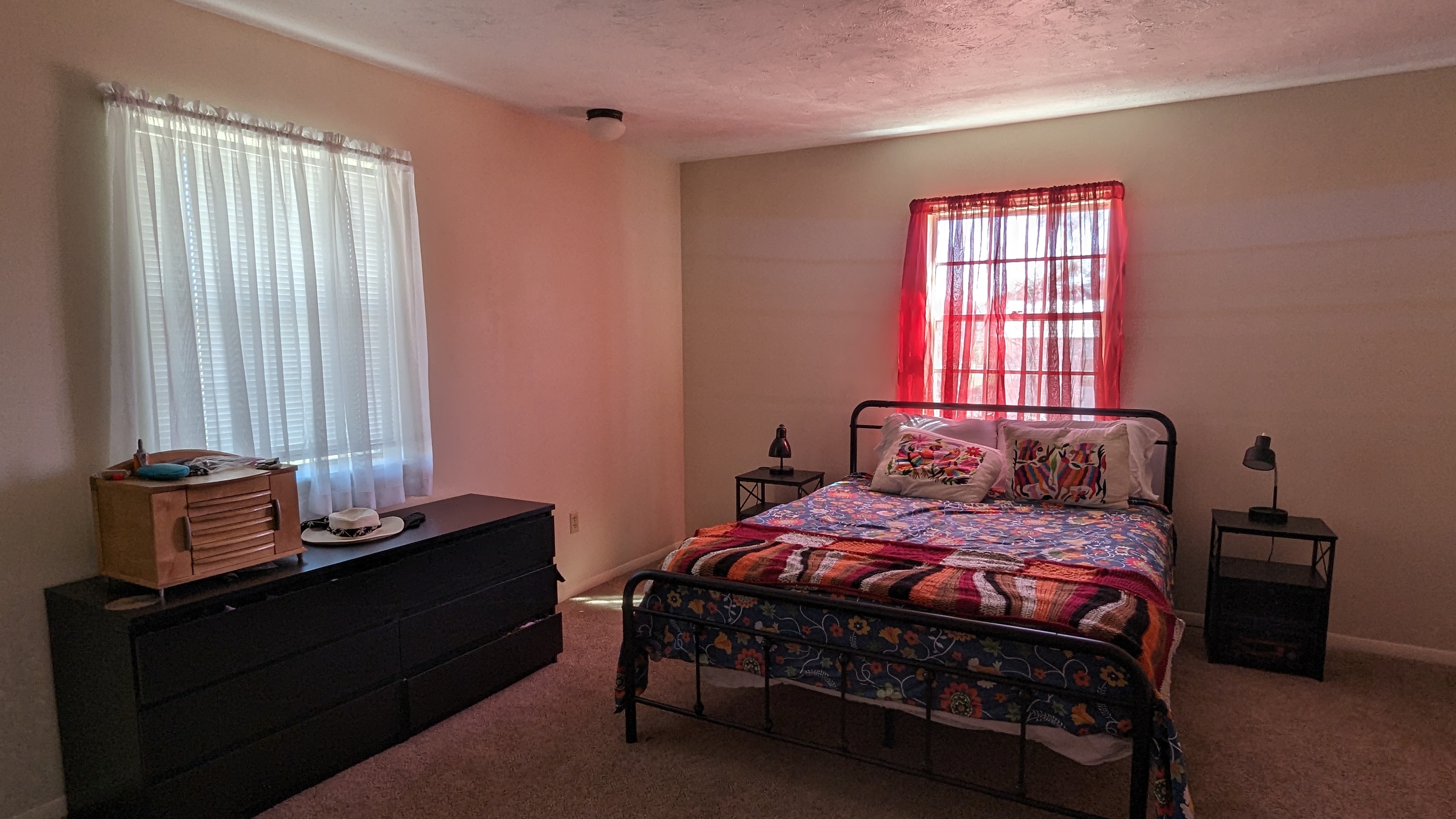 Sparsely furnished bedroom